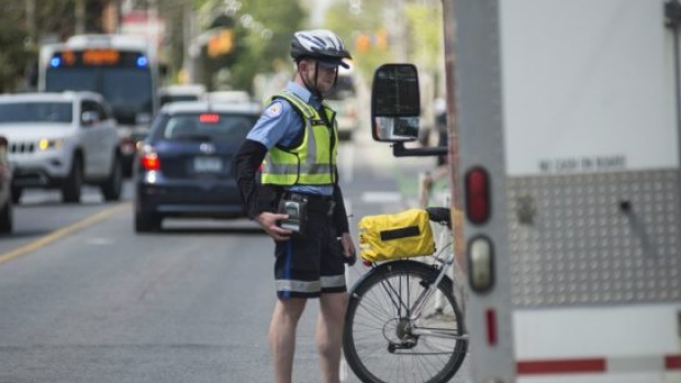 parking-enforcement-officer-kyle-ashley-toronto-cyclist